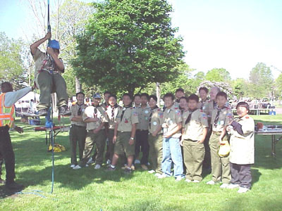 Boy Scouts Using Tree Trimming Equipment